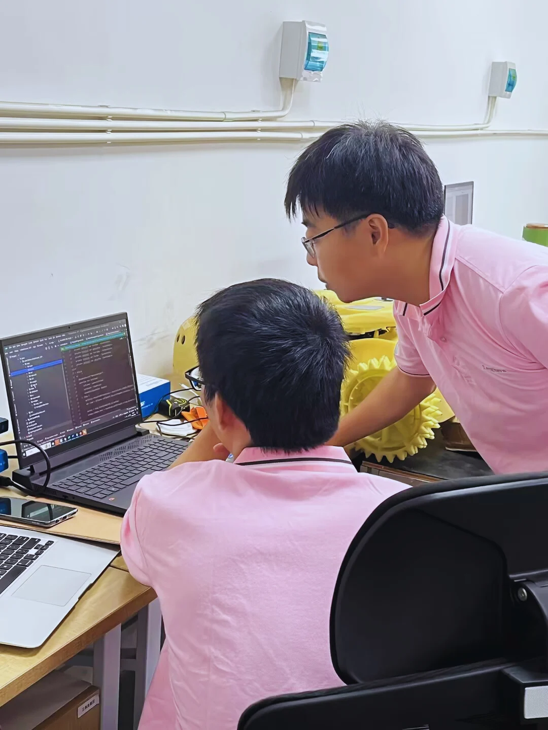 team di ricerca e sviluppo di un'azienda di tosaerba